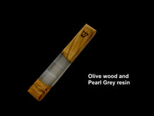 Load image into Gallery viewer, Engraved Handmade Olive wood and pearl grey resin mezuzah on black background
