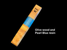 Load image into Gallery viewer, Engraved Handmade Olive Wood and Pearl Blue Resin Mezuzah on black background
