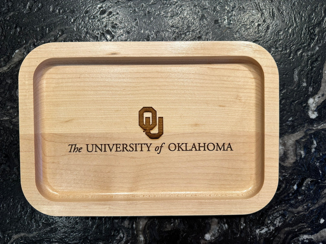The University of Oklahoma valet tray with the OU logo over the words
