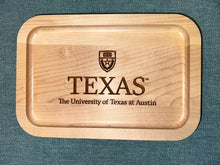Load image into Gallery viewer, University of Texas at Austin Maple Wood Ring Tray with University Crest laying on black surface
