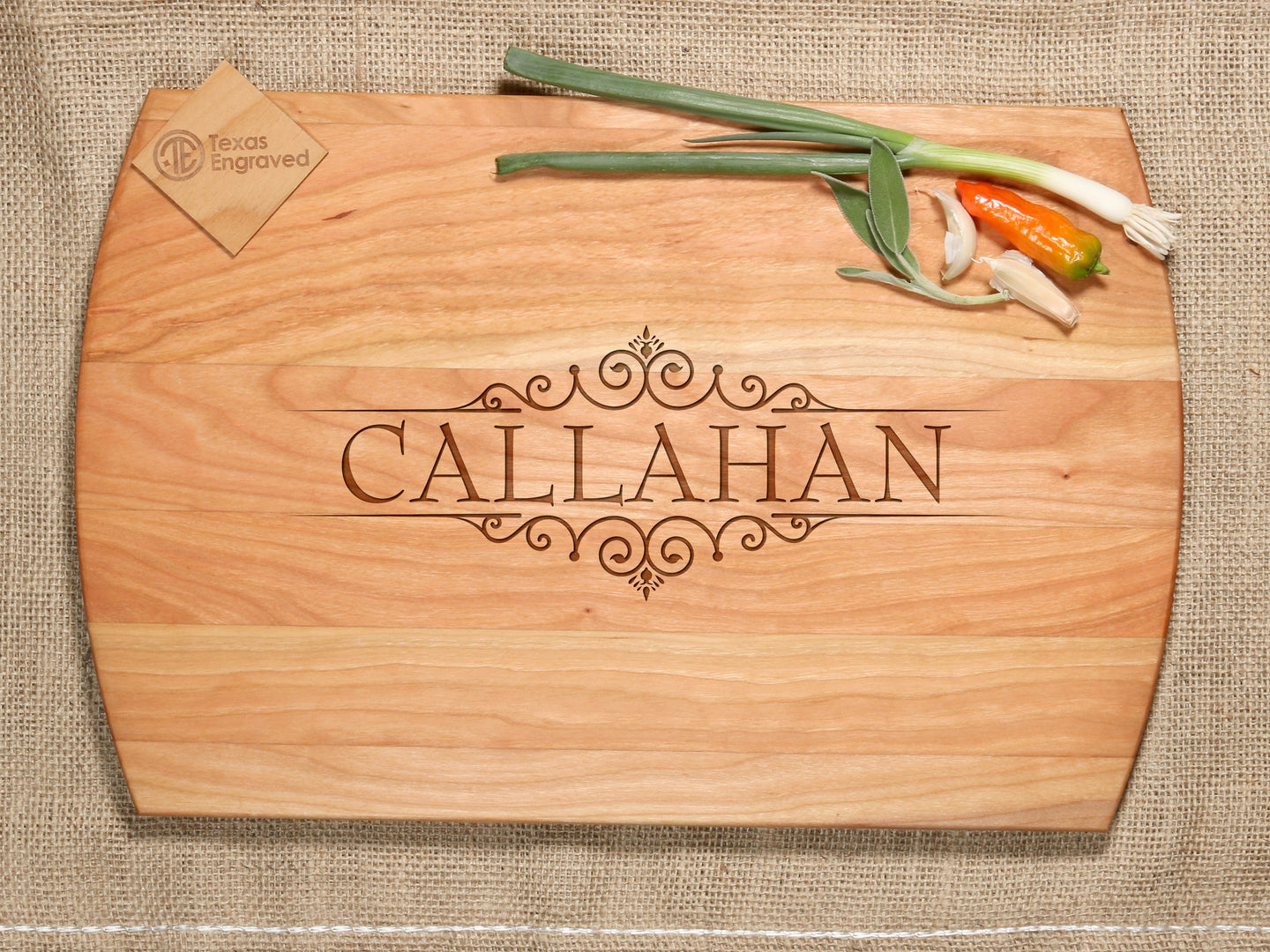 Last Name with Flourishes Cutting Board - D4